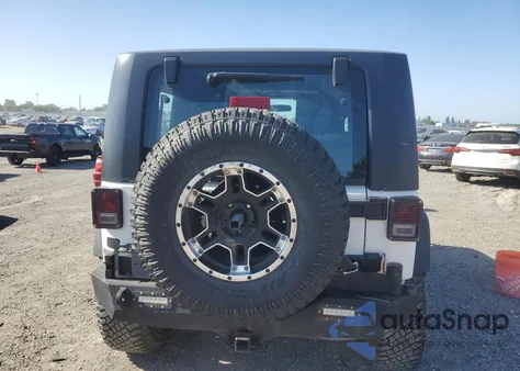 2010 Jeep Wrangler Rubicon z USA, uszkodzony, nr VIN 1J4BA6D18AL221240